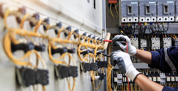 Professional Electrician technician working in Lexington, MO